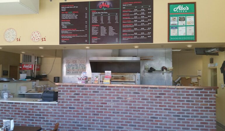 Abo's Pizza Northglenn interior — ordering counter and menu board